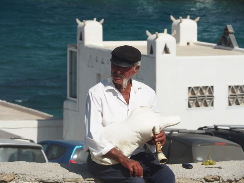 Greek musician, traditional Greek musical instrument, Mykonos, Cyclades, Greek Islands