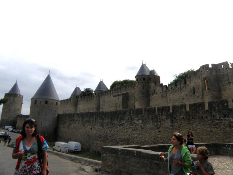 medieval walled city, turrets, ramparts, moat, France 