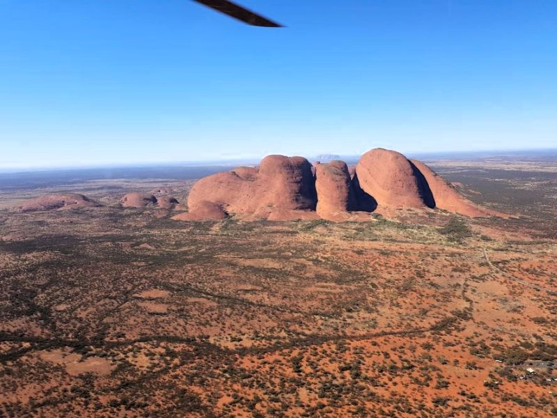 Uluru and Kata Tjuta lined up, helicopter ride over Uluru, Australian landmark