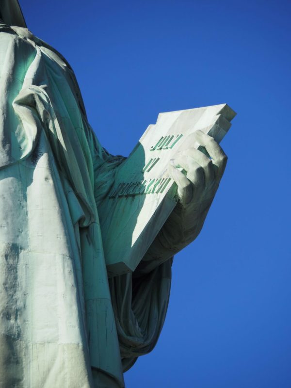 Statue of Liberty holding in her hand, Ellis Island, New york must-do